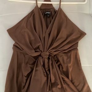 Rust colored sleeveless blouse